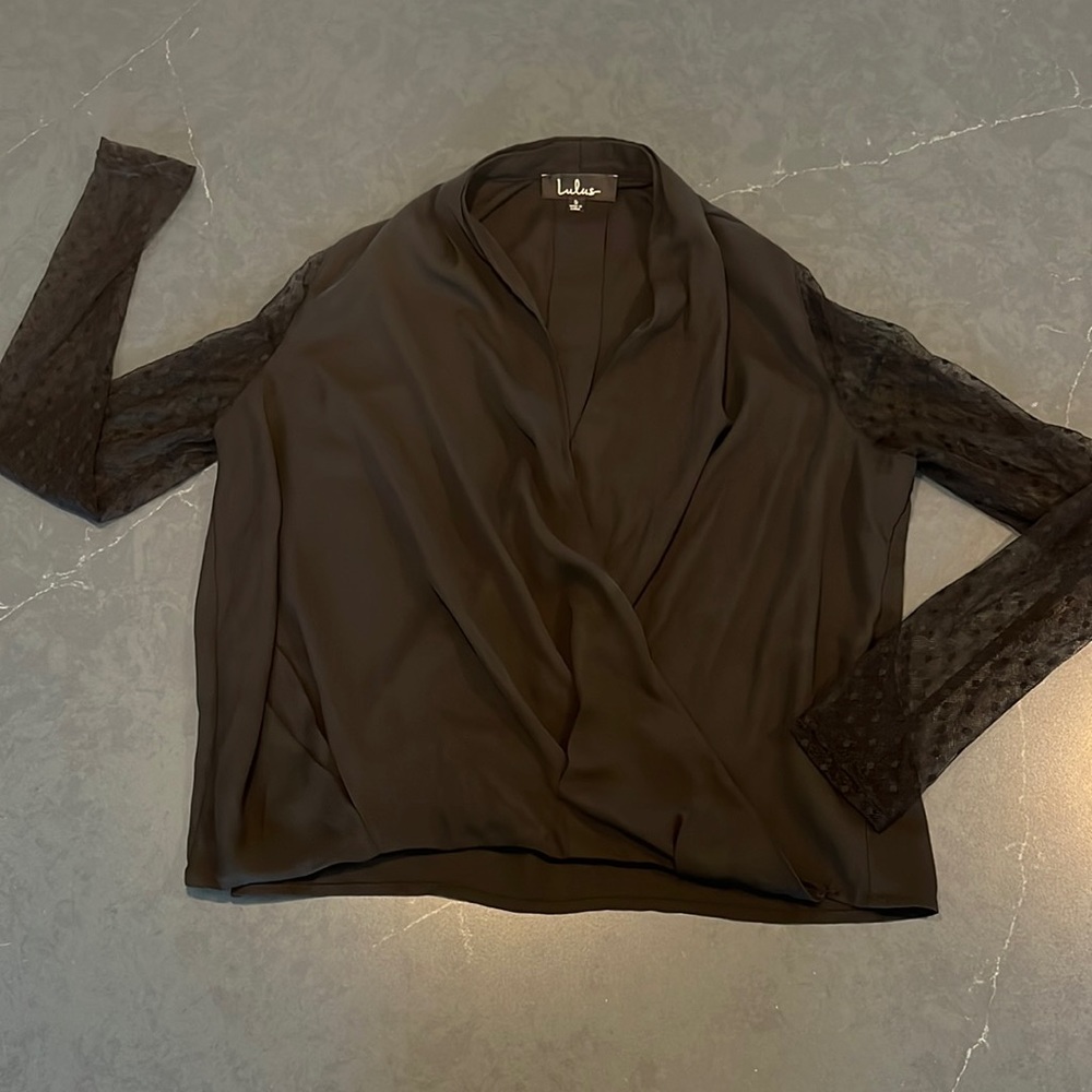 Sexy black blouse with sheer sleeves